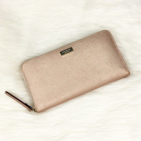 kate spade Handbags - Kate Spade Newbury Lane Neda Rose Gold Wallet